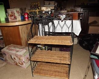 3 shelf metal and wicker shelf. $25.00