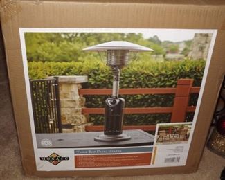 13.   New in box. Table top 1.1 lb. Patio Heater   $100.00