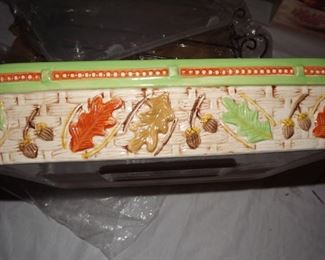 16.  14 x 10 1/4 inches casserole dish. Old World temp-tation. New 35.00