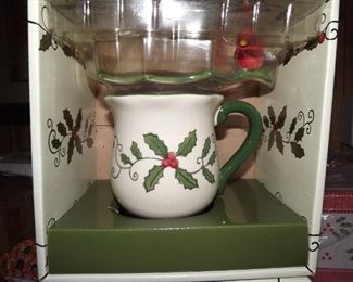 30.    Christmas mugs w/lids. Cardinals on handles. have  2 sets.........$10.00 per set