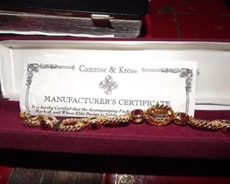 32.   Camrose and Kross Jacqueline Kennedy rope link w/red crystal bracelet. Still in box.  $75.00