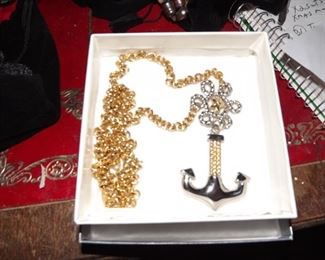 34.   Anchor Pendant . gold and silver . $15.00