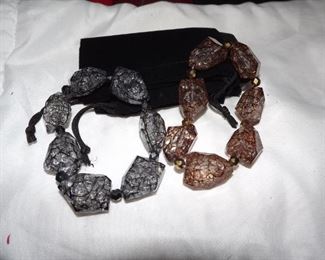 41.  2 stretch bracelets. Acrylic beads.  $10.00