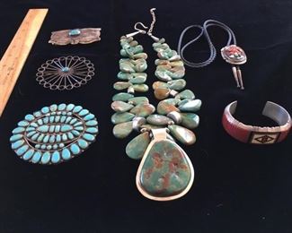 #42 A $195 Zuni turquoise pin; B $35 central turquoise pin; C $75 turquoise and silver buckle; D $300 huge turquoise and silver necklace hallmarked A Cox/Coy with thunderbird; E $125 Jerry T Nelson inlaid coral cuff; F $75 bolo tie