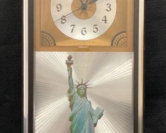 100 Year anniversary Statue of Liberty Clock with Silver Dollar 1986 Silver Eagle uncirculated....