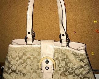 Coach Purse has a few stains, see photos $28