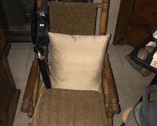 ANTIQUE WOOD AND LEATHER CHAIR $100