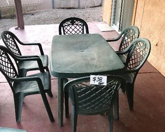 PATIO SET.  TABLE AND 6 CHAIRS (PLASTIC)  $38 SET 