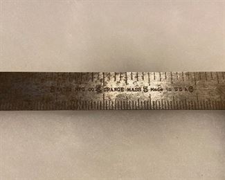 Close up of Bates Mfg. square ruler