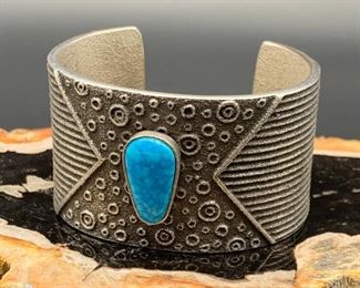 12. $750 - Rebecca T Begay Native American Navajo Sterling Silver Tufa Cast Bracelet