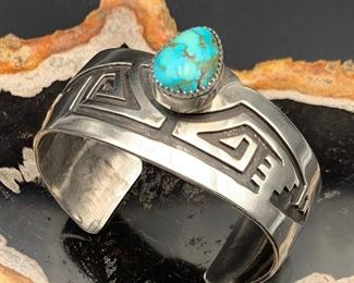 28. $225 - Sterling Silver Native American Cuff Bracelet Tribal Design & Turquoise Accent