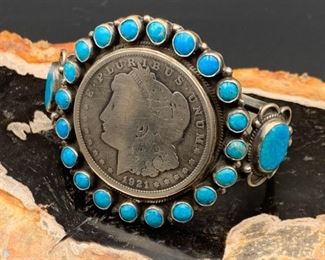 43. $550 - Dean Brown Native American Navajo 1921 Morgan Silver Dollar Cuff Bracelet
