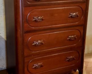 Antique three piece bedroom set has carved pulls and is in excellent condition.  1.  Chest of drawers