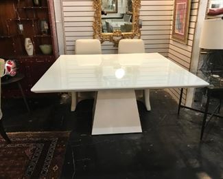 Artefacto Dining Table Originally $5,000 Sale price $1750. Glass top white glossy enameled wood.