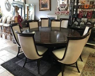 Marge Carson round wood Dining Table with eight fabric/wood chairs.  The most comfortable chairs you have ever sat in! Originally $8,500 sale price $3200.