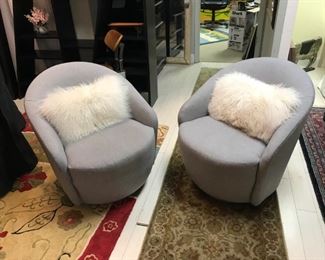 Pair of Artefacto fabric swivel chairs. Sale price $675 pair. Compliments everything!