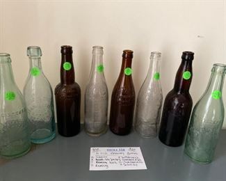 Item #124:   8 Old Brewery Bottles                                   $25