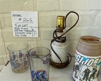 # 262	4 Pc. Lot -  Esso Glass - GI Joe Thermos	- Milk Glass Lamp - Glass	                                                                      $7
