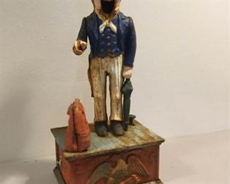Mechanical Uncle Sam cast iron bank https://ctbids.com/#!/description/share/386885