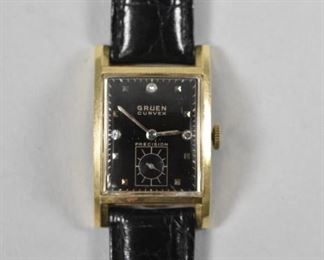 Man's 14K Gruen Diamond Dial Wristwatch