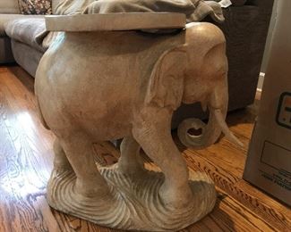 ELEPHANT TABLE, 2 available; 23.25” Tall, approx 23” long at base, 13” circle diameter
