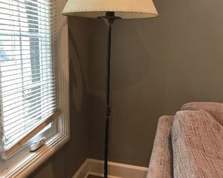 FLOOR LAMP, 1 of 2, 67” tall, wrought iron rustic  with oil skin? shade
