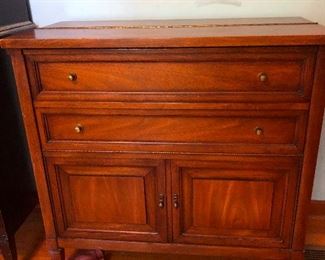 this dresser opens up to be a bar