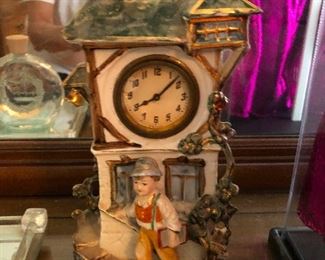 Figurine depicting largest boy in Germany outside his house. (Is that an ogre in the mirror up there on the left?)