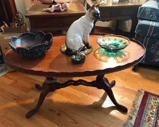 I already broke the ceramic cat you see in this picture. Cher says I'm not allowed in the house