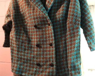 Lots of vintage dresses and cocktail suits