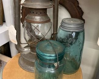 Blue ball canning jars and a vintage kerosene lamp (I think Laura Ingalls once owned this lantern.... okay.. maybe one like it?)..