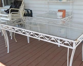 $180.00 Iron Outdoor Glass top Patio Table