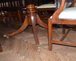 $3,000 Dining Table Mahogany Rosewood 135"W (includes 2 leafs 19 1/2" each) x 5ft D with pads. 12 Chairs covered with leather seats. $5,000