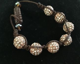 Heavy sparkly beads with adjustable tightening strap$10