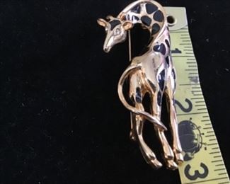 Cool giraffe lapel pin with diamond eyes $15