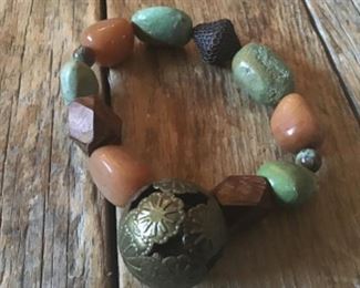 Antique unique heavy stone, beads and brass handmade ball. $20
