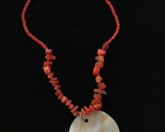 Mother of Pearl with corral pieces. 8 inch drop. $20. Shipping based on buyers location 