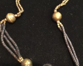 Primitive necklace purchased in Africa. Handmade brass ball beads . $20. Shipping based on buyers location 