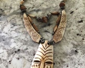 Hand carved bone necklace with silver beads $20