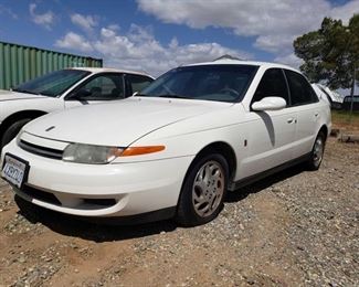 222: 	
2002 Saturn L Series
Year: 2002
Make: Saturn
Model: L Series
Vehicle Type: Passenger Car
Mileage:
Plate: 4XBY740
Body Type: 4 Door Sedan
Trim Level: L200
Drive Line: FWD
Engine Type: L4, 2.2L; DOHC 16V
Fuel Type: Gasoline
Horsepower:
Transmission: Automatic
VIN #: 1G8JU54F42Y591842
Features and Notes:
MU Power Windows, Door Locks, Mirrors, Cruise Control