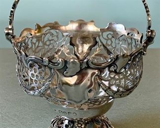 Item 103: Antique 19thc English Sterling Silver Reticulated Basket, 3.75" across, with bail extended it is appx. 5-1/4 Tall: $75