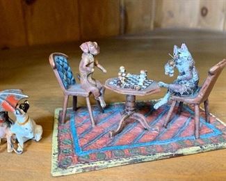Miniature metal dog and cat playing chess and two dogs sharing umbrella: $14