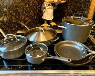 Item 125: Set of Calphalon - 2.5 qt with lid, 1 qt with lid, 8" fry pan, 10" fry pan, 8 qt stock pot with lid, 5 qt saute/fry pan with lid, in good condition: $125