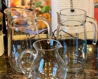 Two large glass pitchers and one smaller: $14
