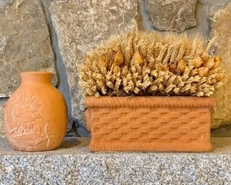 Two terra cotta pieces - one "woven" trough planter and sunflower vase: $24