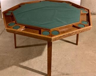 Item 100: New game table with felted top: $75