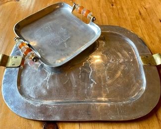 Two metal serving platters, each with interesting handles: $22