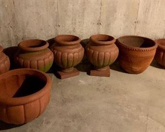 Lots of great terra cotta pots: $75 each - braided one on right is sold! 