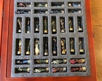 Chess set with bronze and pewter(?) civil war pieces.