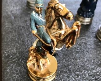 Chess set with bronze and pewter(?) civil war pieces.